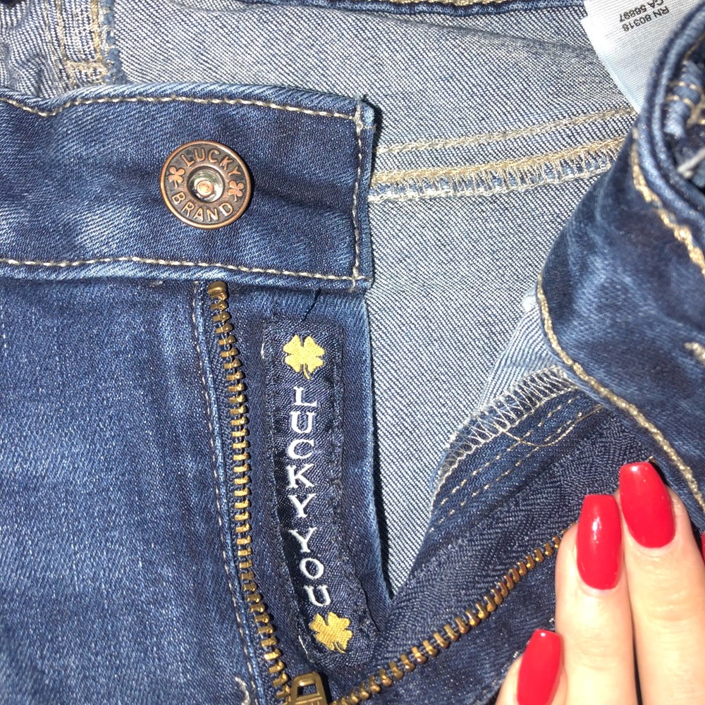 lucky brand jeans w/ slight rips